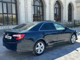 Toyota Camry 2013 года за 7 300 000 тг. в Жанаозен – фото 4