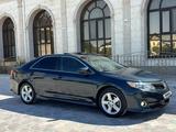 Toyota Camry 2013 года за 7 300 000 тг. в Жанаозен