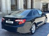 Toyota Camry 2013 года за 7 300 000 тг. в Жанаозен – фото 5