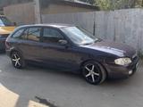 Mazda 323 1998 года за 1 000 000 тг. в Алматы – фото 2