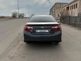 Toyota Camry 2014 года за 8 500 000 тг. в Балхаш – фото 2