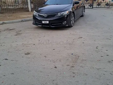 Toyota Camry 2014 года за 5 500 000 тг. в Жанаозен