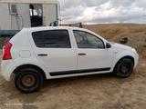 Renault Sandero 2013 года за 3 200 000 тг. в Актобе – фото 2