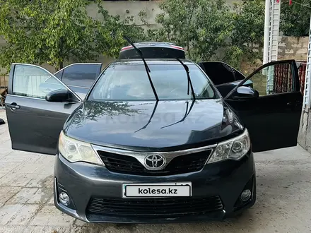 Toyota Camry 2013 года за 8 300 000 тг. в Жанаозен – фото 2