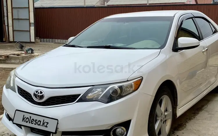 Toyota Camry 2013 года за 7 600 000 тг. в Атырау