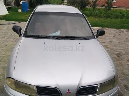 Mitsubishi Carisma 2002 года за 2 100 000 тг. в Актобе – фото 5