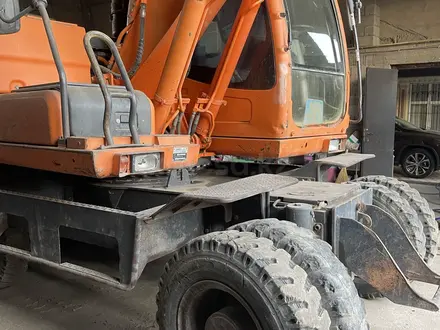 Doosan  DX140W 2014 года за 28 000 000 тг. в Шымкент