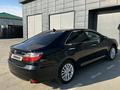 Toyota Camry 2015 годаүшін10 900 000 тг. в Актобе – фото 4