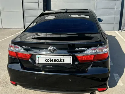 Toyota Camry 2015 года за 10 900 000 тг. в Актобе – фото 5