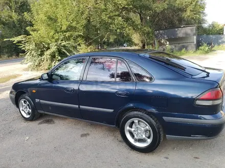 Mazda 626 1996 года за 1 800 000 тг. в Алматы – фото 7