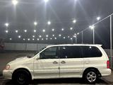 Kia Carnival 2001 года за 1 700 000 тг. в Шымкент – фото 4