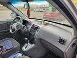 Hyundai Tucson 2009 года за 5 300 000 тг. в Уральск – фото 2