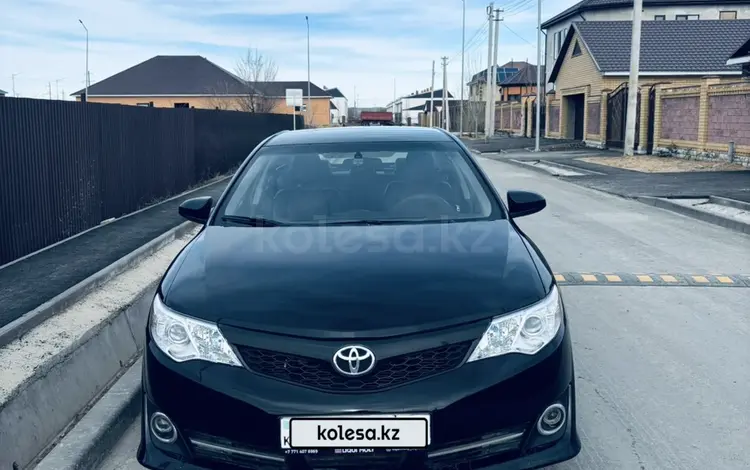 Toyota Camry 2013 годаүшін7 100 000 тг. в Актобе