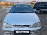 Kia Sephia 1999 года за 450 000 тг. в Жетиген – фото 4