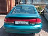 Mazda Cronos 1996 года за 500 000 тг. в Астана – фото 2