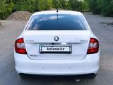 Skoda Rapid 2014 года за 3 100 000 тг. в Уральск – фото 2