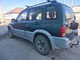 Suzuki Grand Vitara 2003 годаүшін3 200 000 тг. в Атырау