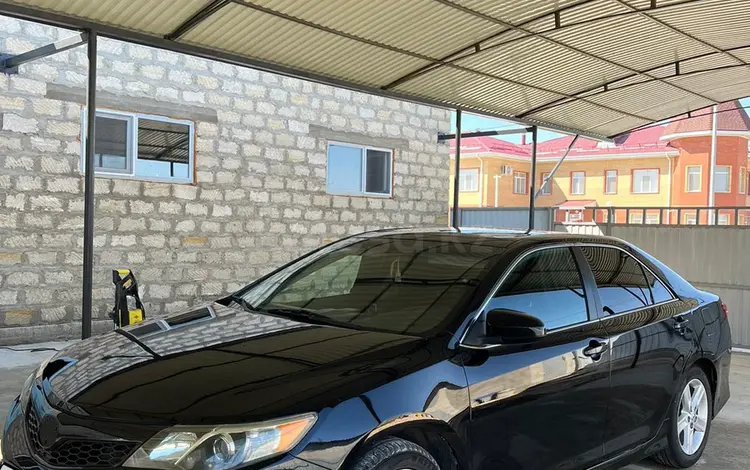 Toyota Camry 2014 года за 7 700 000 тг. в Атырау