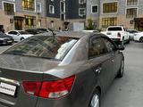 Kia Cerato 2011 года за 4 500 000 тг. в Атырау – фото 5