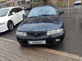 Mitsubishi Carisma 1995 года за 1 400 000 тг. в Астана – фото 2