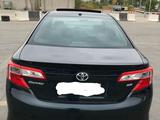 Toyota Camry 2014 года за 7 000 000 тг. в Актобе