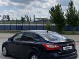 Ford Focus 2013 года за 2 700 000 тг. в Актобе – фото 4