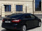 Ford Focus 2013 года за 2 700 000 тг. в Актобе – фото 2