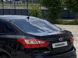 Ford Focus 2013 года за 2 700 000 тг. в Актобе – фото 5