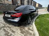 BMW 740 2016 года за 22 000 000 тг. в Алматы – фото 2