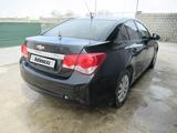 Chevrolet Cruze 2011 года за 2 888 775 тг. в Шымкент – фото 5