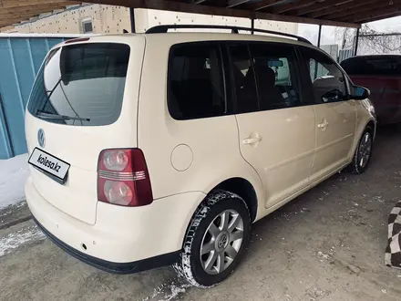 Volkswagen Touran 2010 года за 4 300 000 тг. в Алматы – фото 9