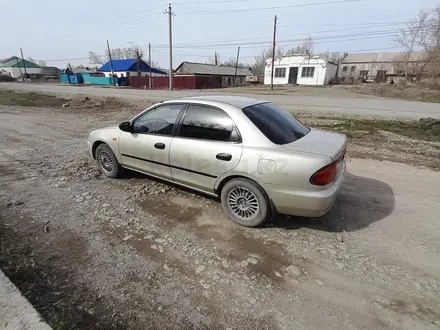 Mazda 323 1995 года за 1 800 000 тг. в Калбатау – фото 6