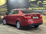 Kia Rio 2014 года за 5 950 000 тг. в Актобе – фото 5