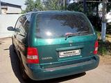 Kia Carnival 2004 года за 3 500 000 тг. в Костанай – фото 2