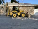 Komatsu  WB97S-2 2002 годаүшін11 000 000 тг. в Алматы