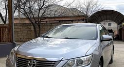 Toyota Camry 2013 года за 8 800 000 тг. в Жанаозен