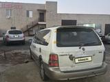 Kia Carnival 2003 года за 800 000 тг. в Атырау – фото 4