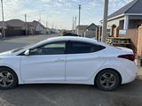Hyundai Elantra 2014 года за 5 000 000 тг. в Атырау – фото 4