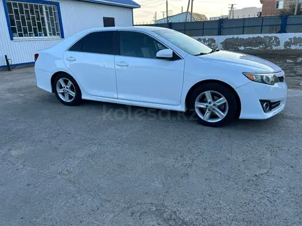 Toyota Camry 2013 года за 5 800 000 тг. в Атырау