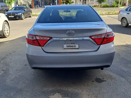 Toyota Camry 2015 года за 7 200 000 тг. в Атырау – фото 4