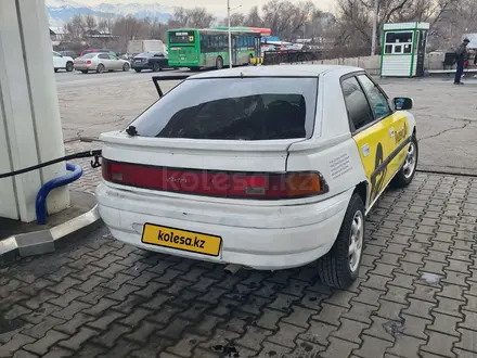 Mazda 323 1991 года за 650 000 тг. в Алматы – фото 2