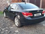 Chevrolet Cruze 2012 года за 4 500 000 тг. в Астана – фото 2