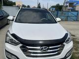 Hyundai Santa Fe 2014 годаүшін11 500 000 тг. в Атырау