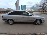 Mazda 626 1998 года за 2 300 000 тг. в Астана – фото 4