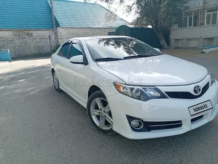 Toyota Camry 2013 года за 5 700 000 тг. в Актобе