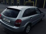 Mazda 323 2002 года за 2 000 000 тг. в Караганда – фото 3