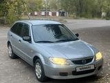 Mazda 323 2002 годаүшін2 000 000 тг. в Караганда
