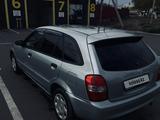 Mazda 323 2002 года за 2 000 000 тг. в Караганда – фото 4
