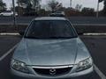Mazda 323 2002 года за 2 000 000 тг. в Караганда – фото 7