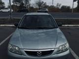 Mazda 323 2002 года за 2 000 000 тг. в Караганда – фото 5